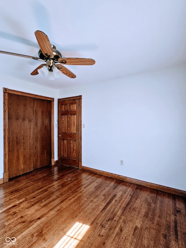 4109 E Epler Ave, Indianapolis, IN 46237 - unfurnished bedroom with ceiling fan, baseboards, and wood finished floors
