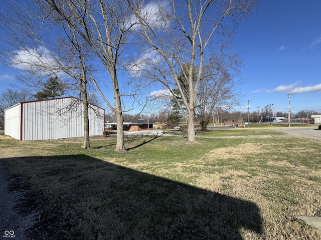 view of yard with an outbuilding and an outdoor structure