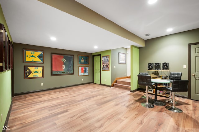 home office with recessed lighting, light wood-type flooring, and baseboards