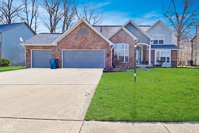 traditional home with brick siding, a front lawn, driveway, and an attached garage