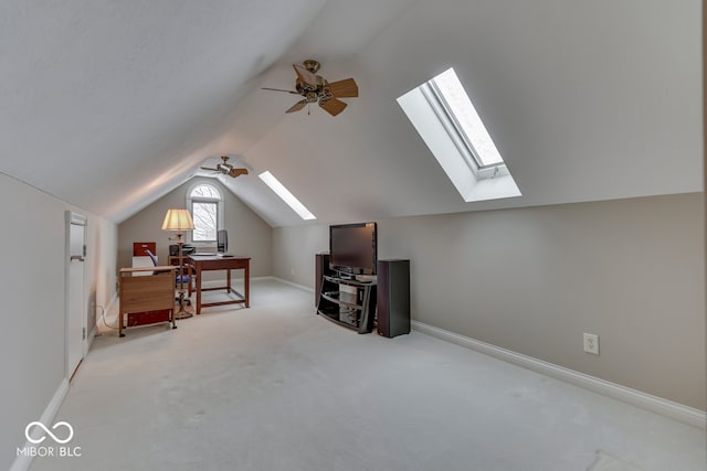 additional living space featuring baseboards, lofted ceiling, a ceiling fan, and carpet flooring