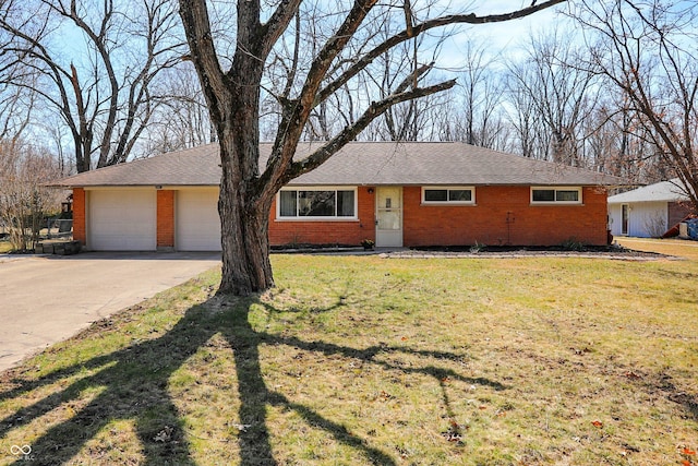 ranch-style house with a front lawn, concrete driveway, brick siding, and an attached garage