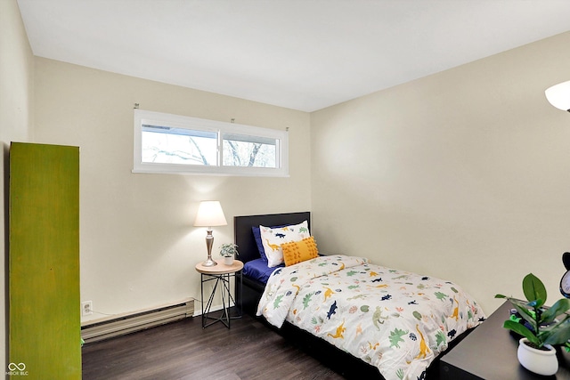 bedroom featuring baseboard heating and dark wood-style flooring