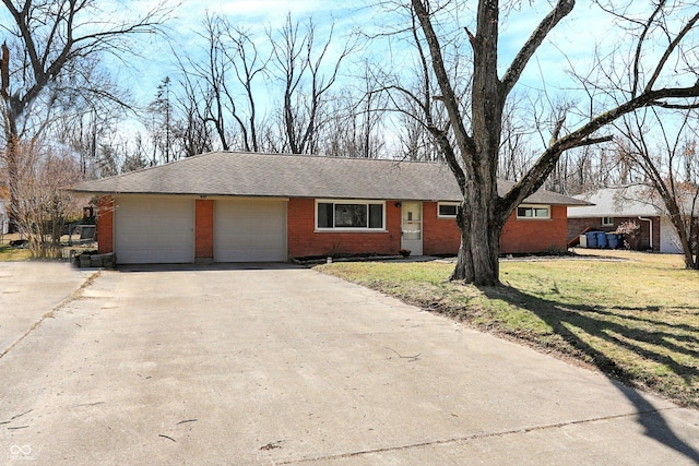 ranch-style house with brick siding, a shingled roof, a front yard, a garage, and driveway