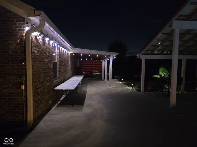 view of patio at night