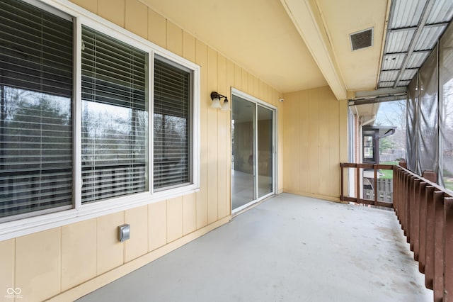 balcony with visible vents and a patio