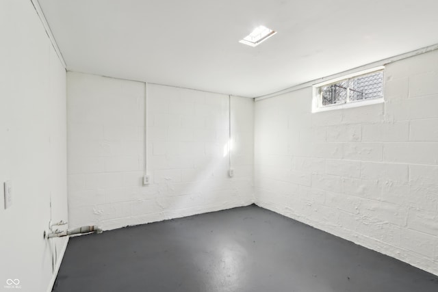 basement featuring concrete block wall