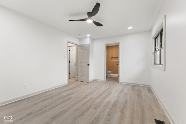 unfurnished bedroom featuring visible vents, connected bathroom, baseboards, recessed lighting, and light wood-style floors