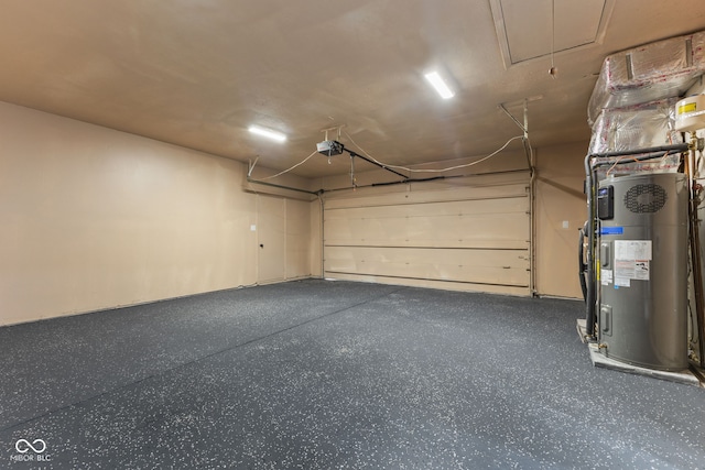 garage featuring water heater and a garage door opener