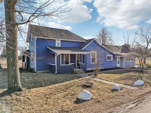 4844 N 700 W, Mccordsville, IN 46055 - traditional home with a front lawn, brick siding, and a chimney