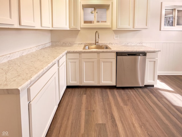 kitchen featuring dark wood-style flooring, a sink, white cabinets, glass insert cabinets, and stainless steel dishwasher