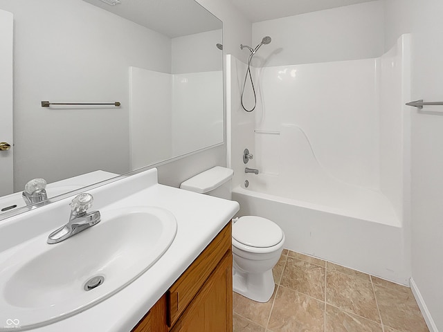 bathroom featuring tub / shower combination, toilet, and vanity