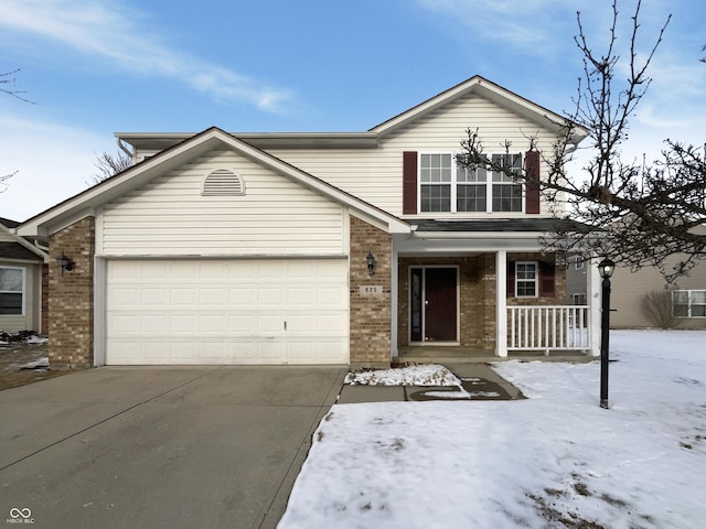 traditional-style home with brick siding, covered porch, driveway, and an attached garage