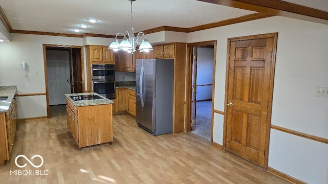 kitchen with ornamental molding, a center island, appliances with stainless steel finishes, light wood finished floors, and hanging light fixtures