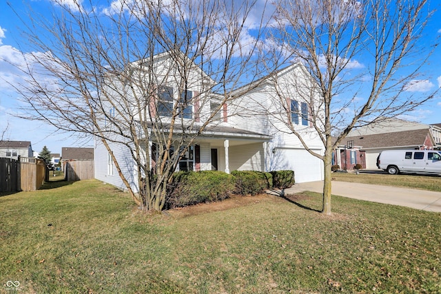 traditional home featuring a garage, concrete driveway, a front lawn, and fence