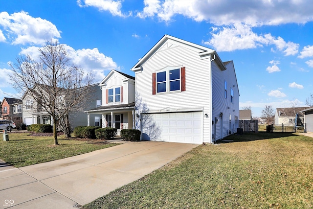 traditional home featuring concrete driveway, a garage, fence, and a front lawn