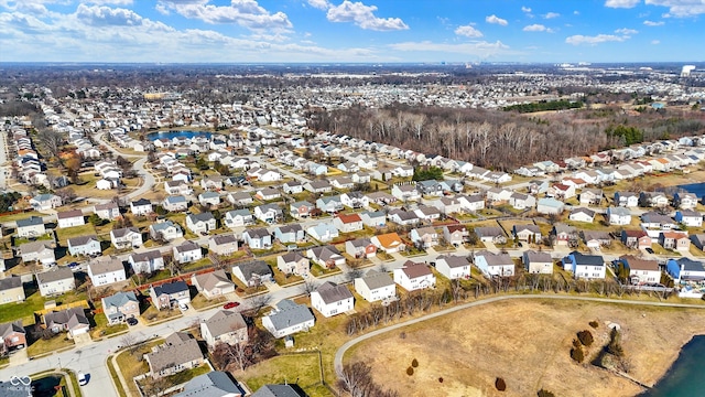 birds eye view of property with a residential view