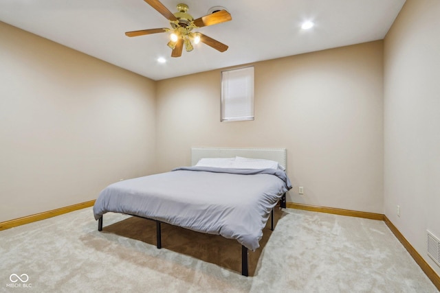 carpeted bedroom featuring recessed lighting, baseboards, and ceiling fan