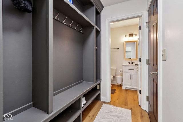 mudroom featuring light wood-style flooring