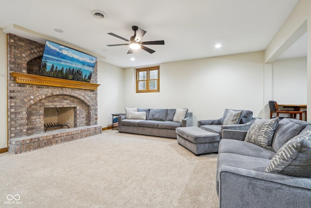 carpeted living area featuring recessed lighting, a fireplace, visible vents, and baseboards