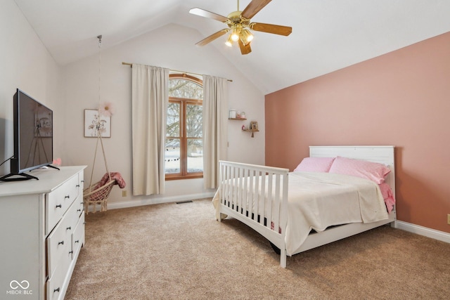 bedroom featuring vaulted ceiling, light colored carpet, visible vents, and baseboards