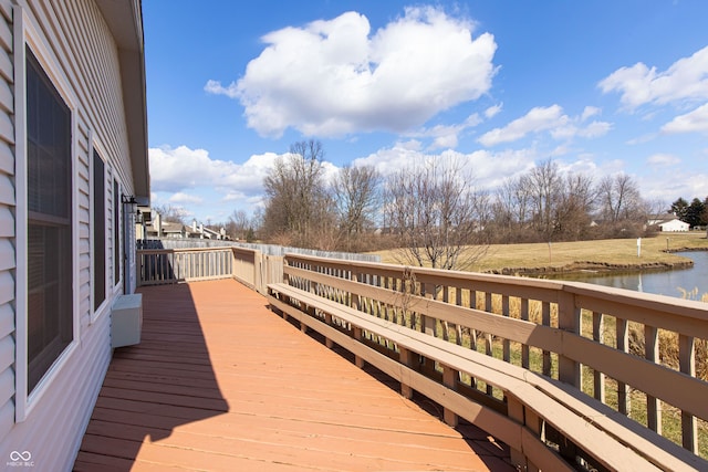 deck featuring a water view