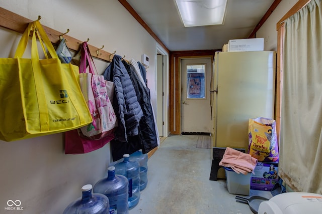 mudroom with concrete floors