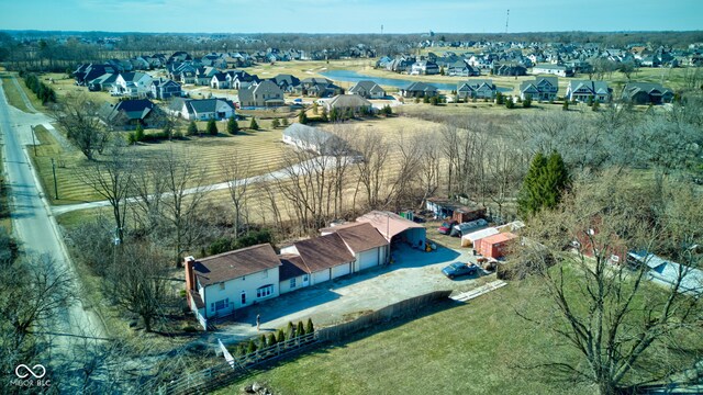 birds eye view of property with a residential view