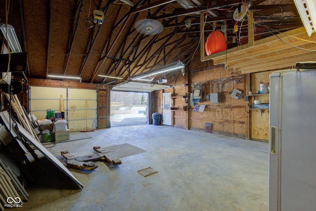 garage with freestanding refrigerator