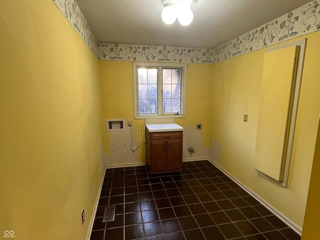 laundry area with washer hookup, cabinet space, baseboards, and electric dryer hookup