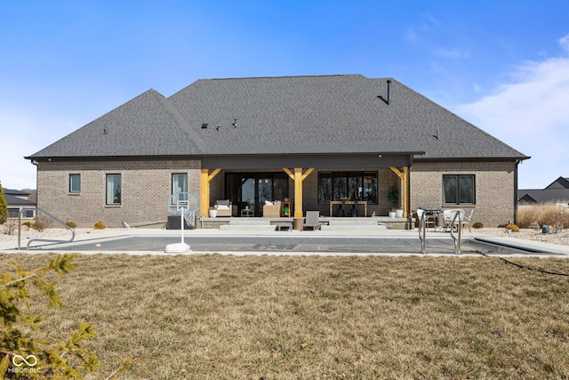 5189 Abbeygate Blvd, Bargersville, IN 46106 - back of house featuring brick siding, a lawn, and a patio