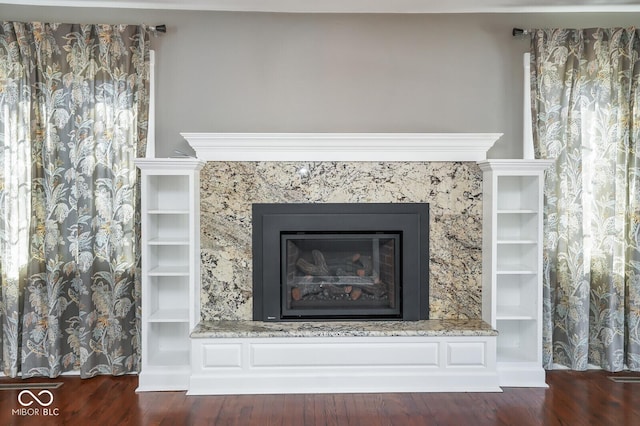 1310 Bowman Dr, Greenfield, IN 46140 - room details with a premium fireplace and wood finished floors