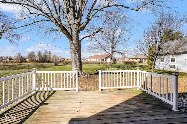 1310 Bowman Dr, Greenfield, IN 46140 - deck featuring a yard, fence, and a residential view