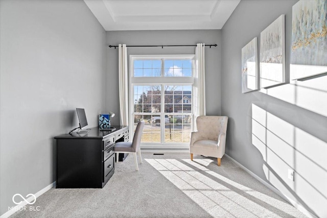 office with baseboards and carpet floors