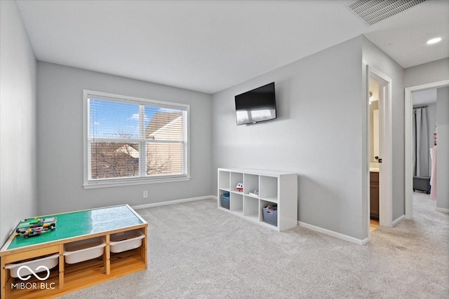 playroom featuring carpet flooring, baseboards, and visible vents