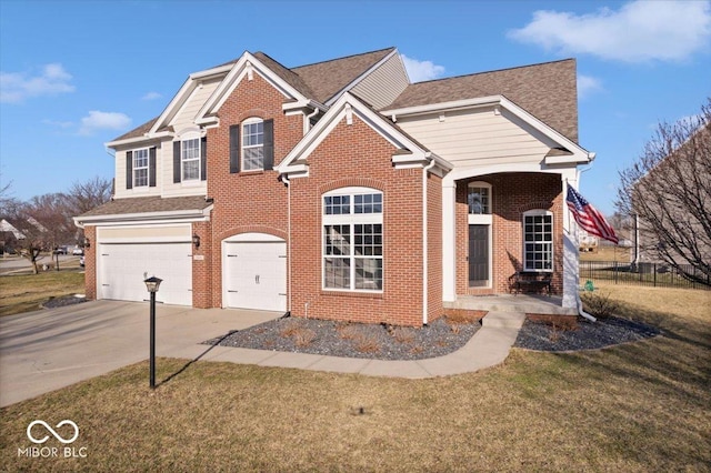 traditional home with brick siding, a front lawn, concrete driveway, and a garage