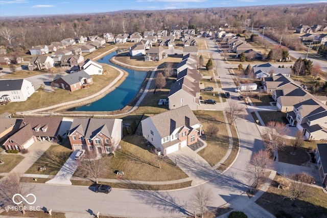 birds eye view of property with a residential view