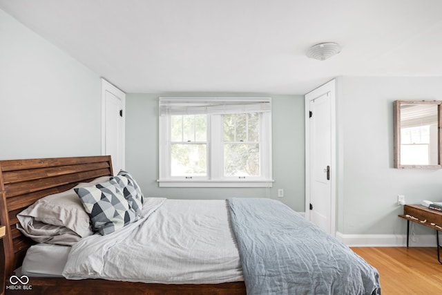 5426 Broadway St, Indianapolis, IN 46220 - bedroom with baseboards and wood finished floors