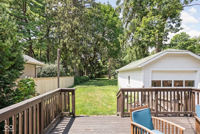 5426 Broadway St, Indianapolis, IN 46220 - wooden terrace with a garage and a lawn