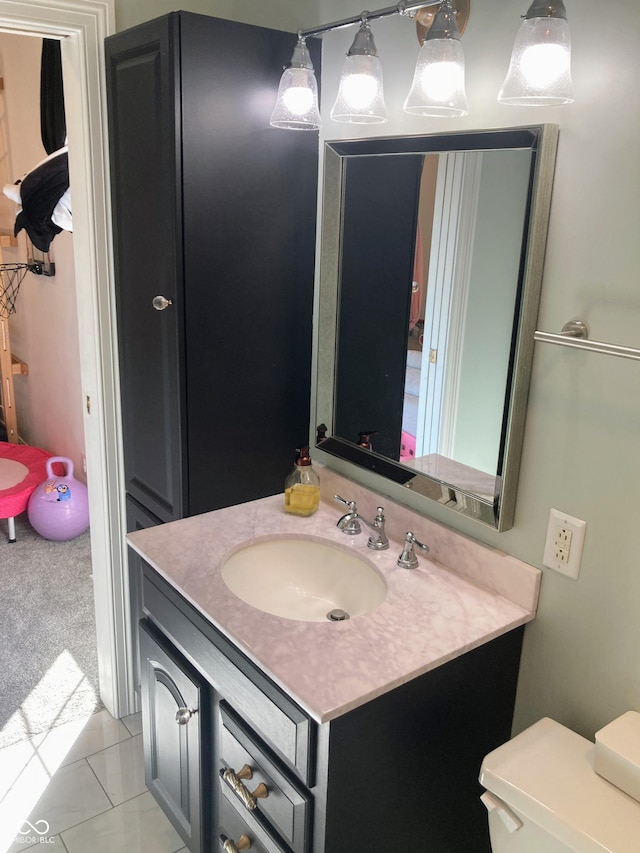 bathroom featuring tile patterned floors and vanity