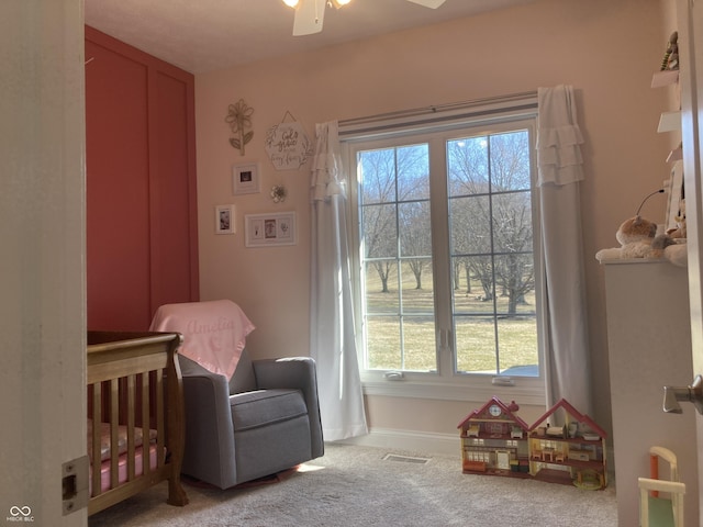 carpeted bedroom with baseboards