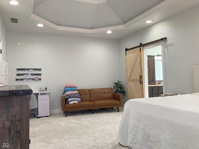 bedroom featuring visible vents, a barn door, a tray ceiling, light carpet, and recessed lighting