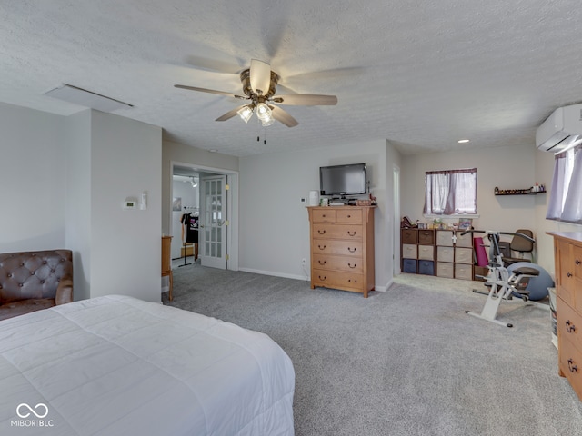 carpeted bedroom with a wall mounted air conditioner, baseboards, a textured ceiling, and a ceiling fan