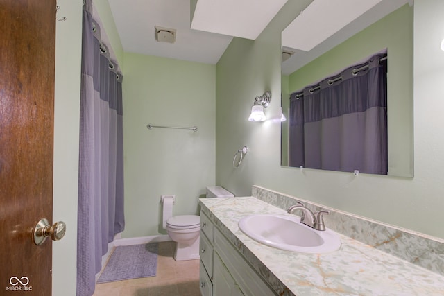 bathroom with baseboards, toilet, a shower with shower curtain, tile patterned floors, and vanity