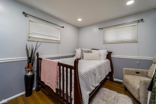 bedroom featuring recessed lighting, baseboards, and wood finished floors