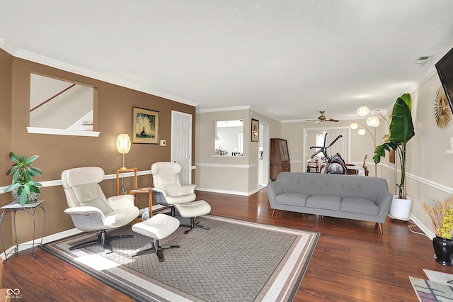living area featuring visible vents, ceiling fan, wood finished floors, and baseboards
