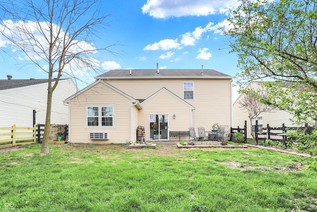 back of house featuring a patio, a yard, and fence