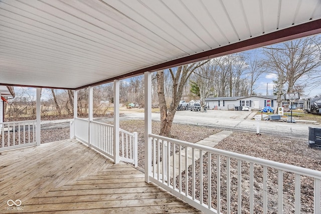 wooden deck featuring a residential view