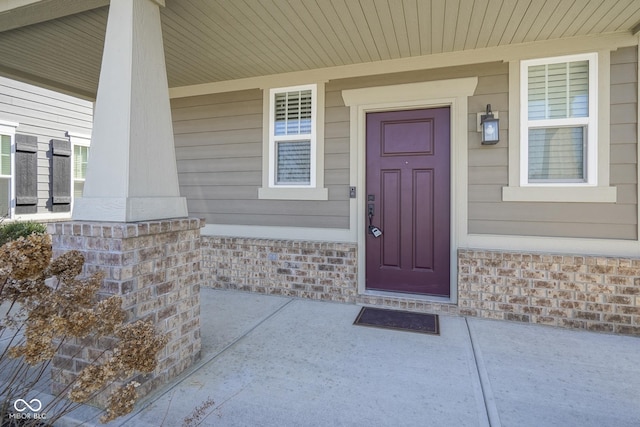 entrance to property with covered porch