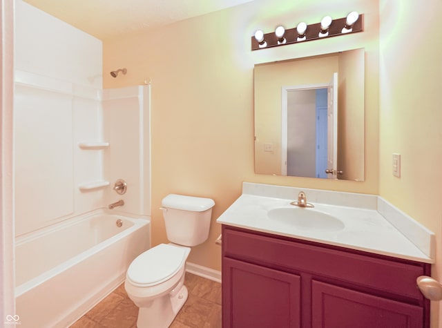 full bathroom with vanity, baseboards, bathtub / shower combination, tile patterned floors, and toilet